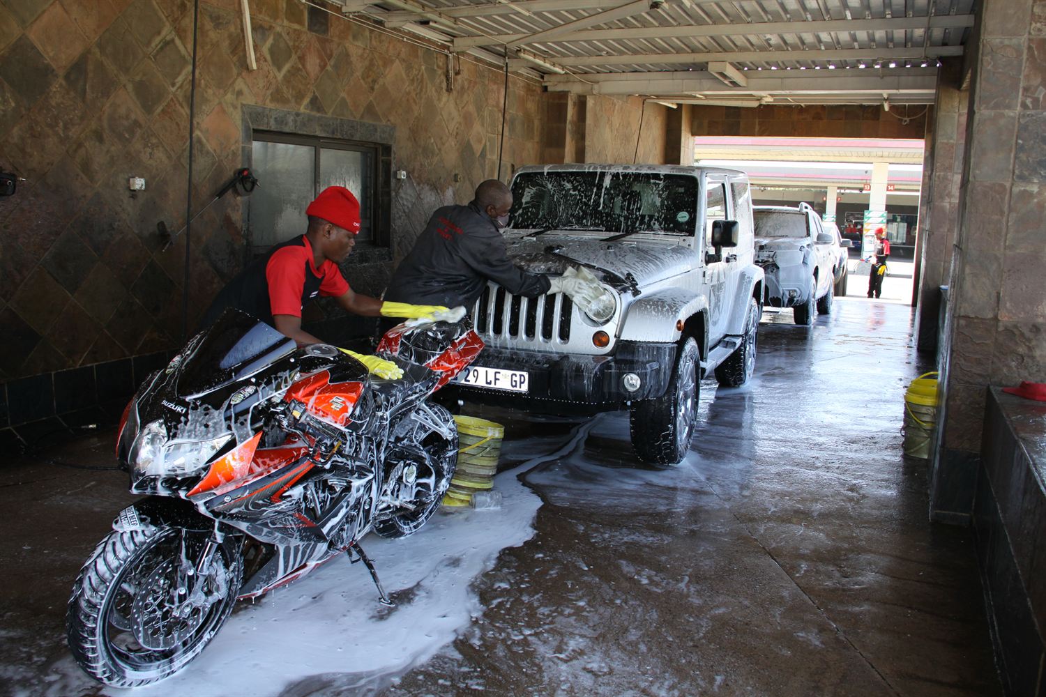 A vehicle being washed at Kilner Park Car Wash